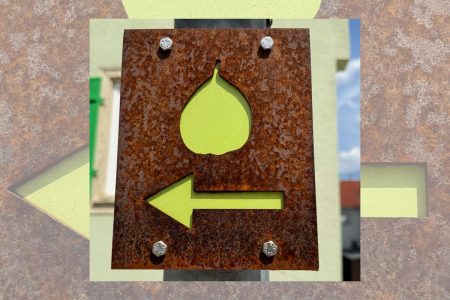 Schild aus Metall mit dem Symbol einer Birne und einem Pfeil