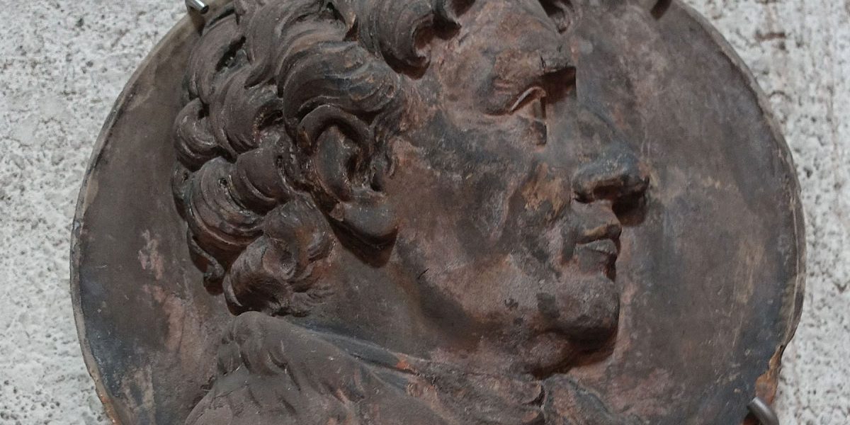 Bronzeplakette mit dem Portrait eines Mannes im Profil